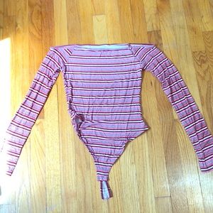 stripped off the shoulder body suit